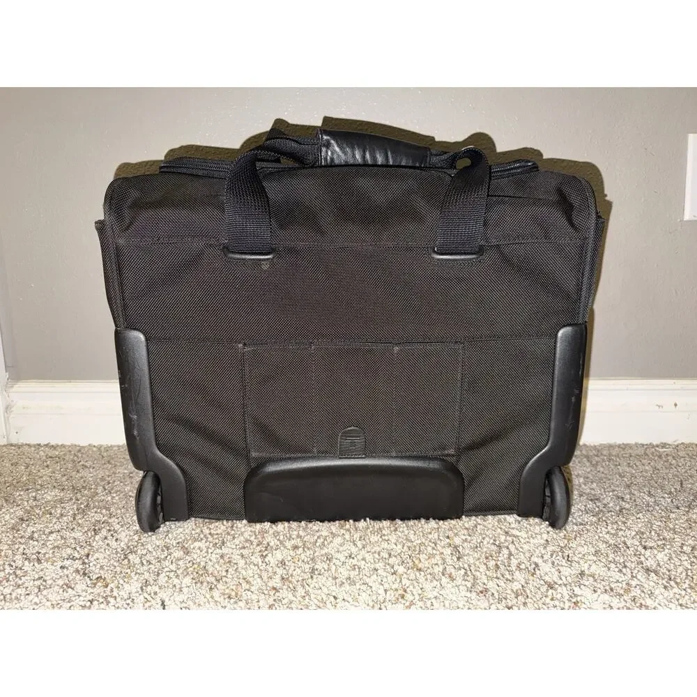 Tumi Alpha 2 wheeled rolling compact carryon suitcase briefcase